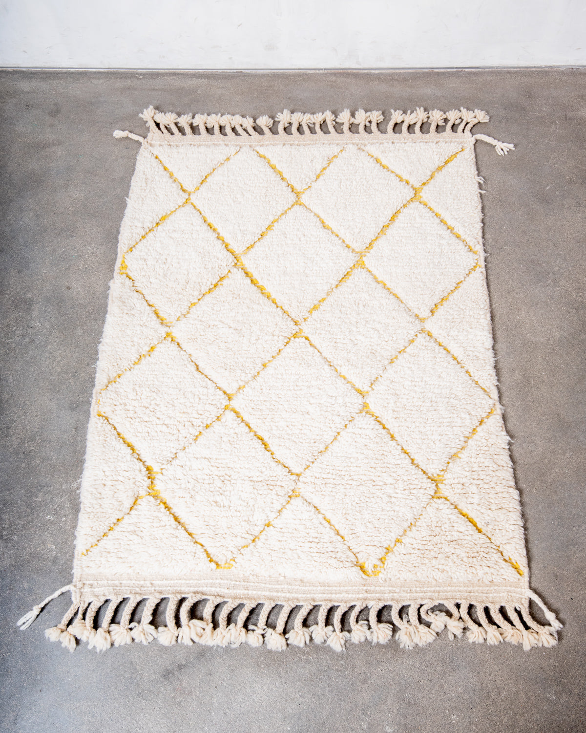 Modern, designer, handcrafted Berber rug from Morocco. Beniourain carpet with beautiful colours and patterns and fluffy wool texture.